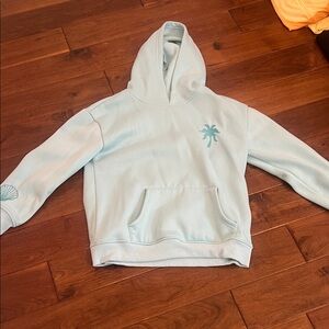 Light Blue Hoodie with Palm Tree Design